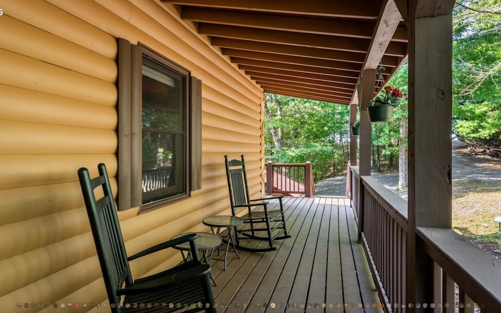 335 Mountain Laurel Lane Blue Ridge, GA 30513 - Photo 29 of 67 a view of a chairs and table in the balcony