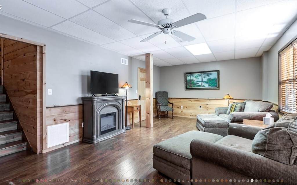 335 Mountain Laurel Lane Blue Ridge, GA 30513 - Photo 45 of 67 a living room with furniture and a flat screen tv