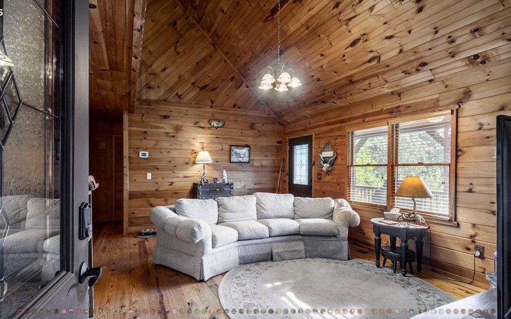 335 Mountain Laurel Lane Blue Ridge, GA 30513 - Photo 66 of 67 a living room with furniture and a large window