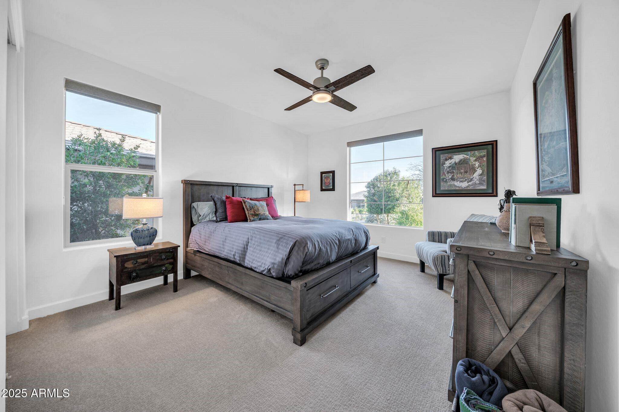 18212 East Parker Creek Road Rio Verde, AZ 85263 - Photo 20 of 47 a bedroom with a bed chair and a window