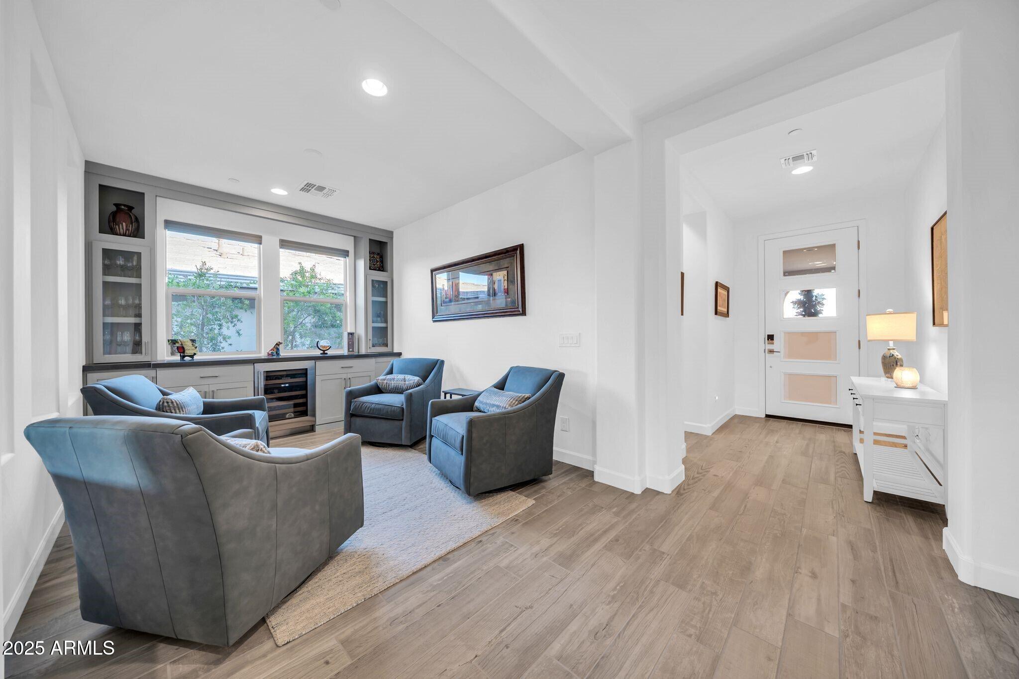 18212 East Parker Creek Road Rio Verde, AZ 85263 - Photo 8 of 47 a living room with furniture and a large window