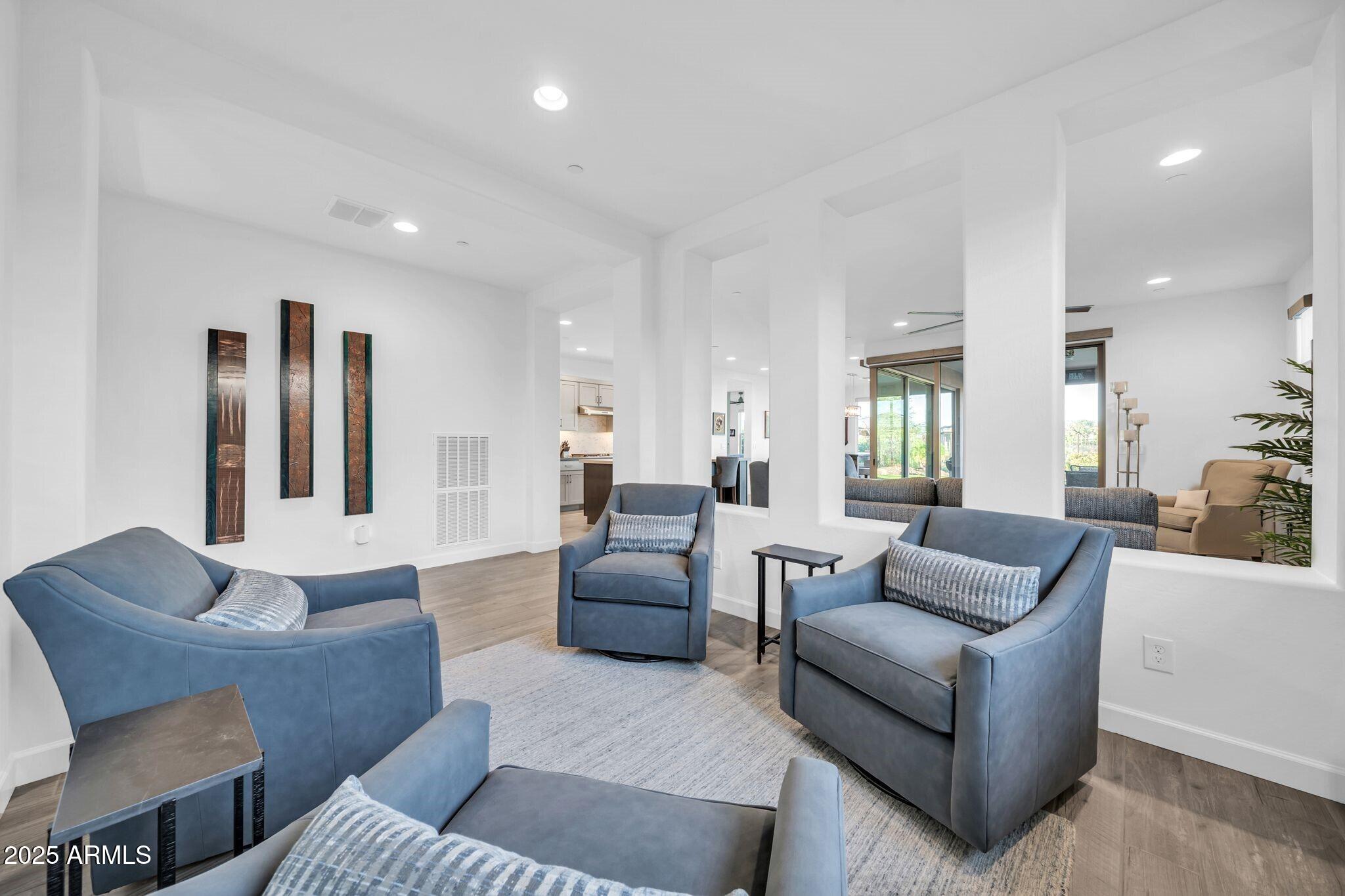 18212 East Parker Creek Road Rio Verde, AZ 85263 - Photo 46 of 47 a living room with furniture and a large window