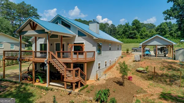 a front view of house with yard outdoor seating and entertaining space
