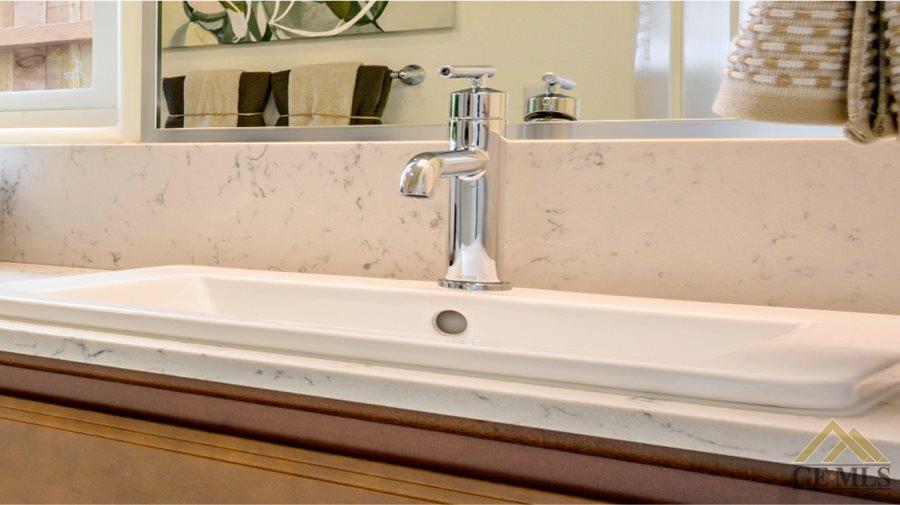 Undisclosed Address Bakersfield, CA 93313 - Photo 5 of 6 a bathroom with a bathtub and a sink