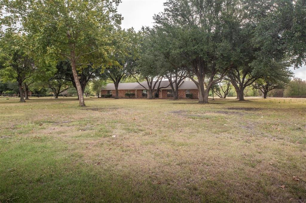 1850 Rock Ridge Road Lucas, TX 75002 - Photo 5 of 34 a view of dirt field with trees