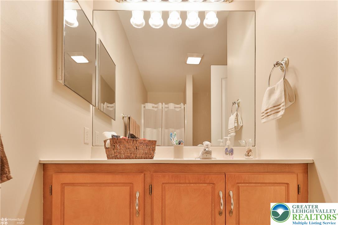 521 South New Street Nazareth, PA 18064 - Photo 20 of 29 a bathroom with a sink and a mirror