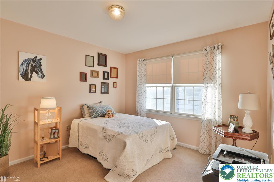 521 South New Street Nazareth, PA 18064 - Photo 21 of 29 a bedroom with a bed and a window