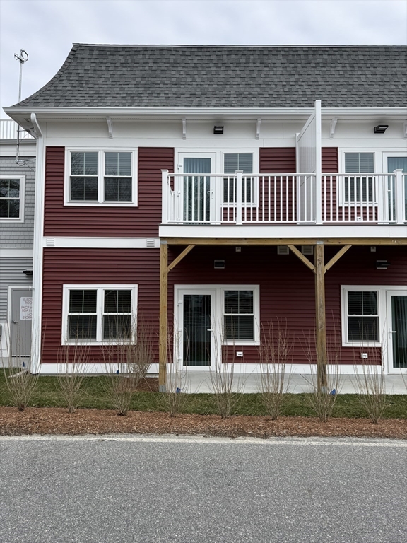 626 Main Street, Unit 110 Dennis, MA 02639 - Photo 14 of 14 a front view of residential houses