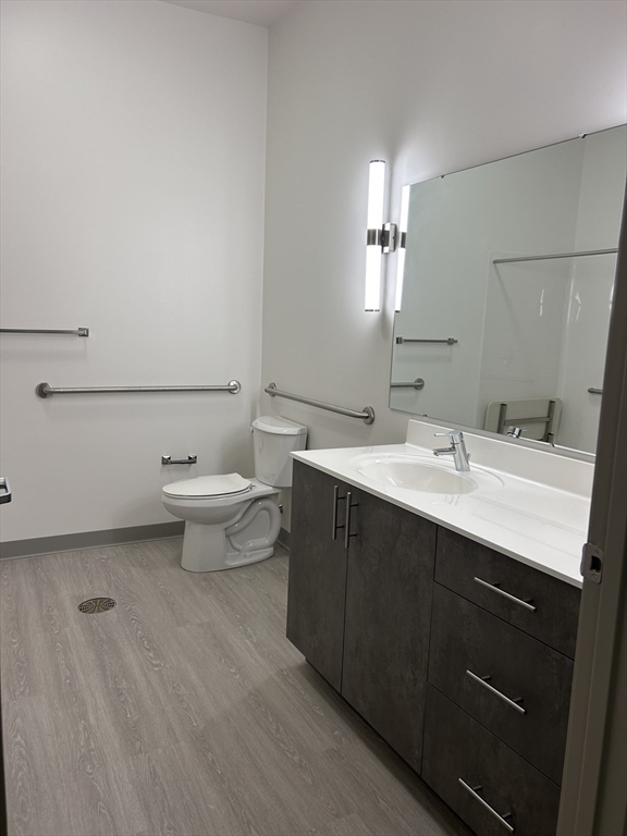 626 Main Street, Unit 110 Dennis, MA 02639 - Photo 6 of 14 a bathroom with a sink and a mirror