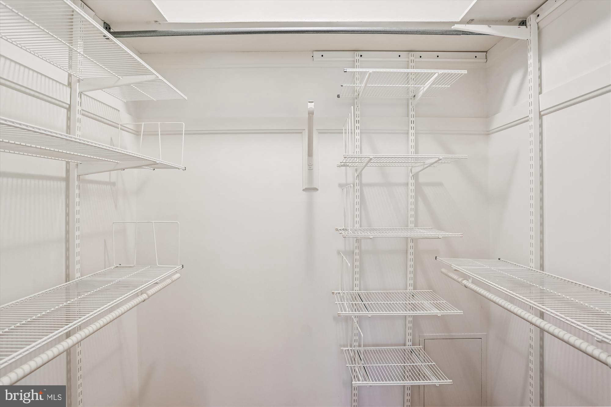 6734 Hillandale Road, Unit 9 Chevy Chase, MD 20815 - Photo 29 of 51 Primary bedroom suite walk-in closet