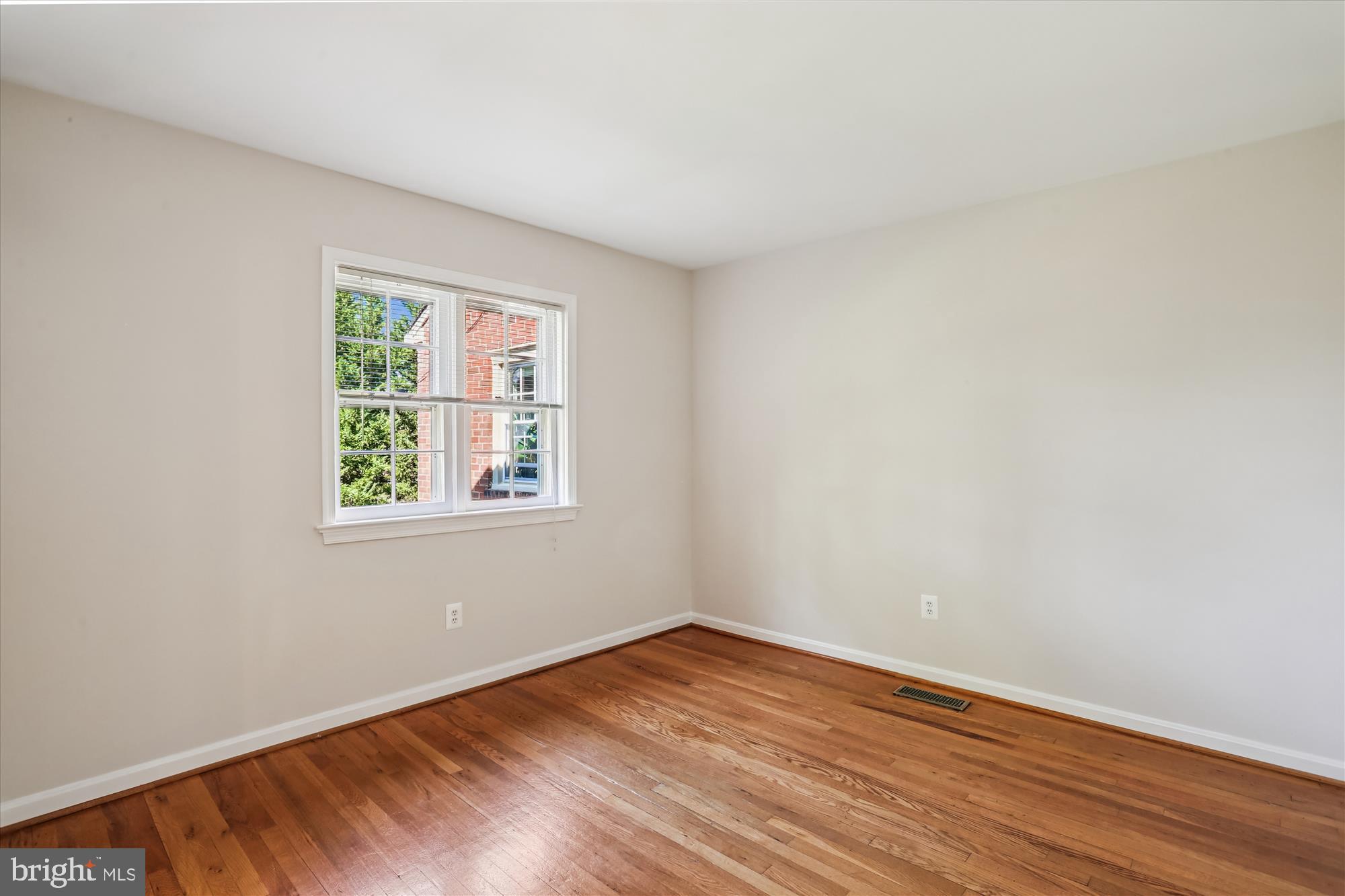 6734 Hillandale Road, Unit 9 Chevy Chase, MD 20815 - Photo 33 of 51 Bedroom #2 with hardwood flooring