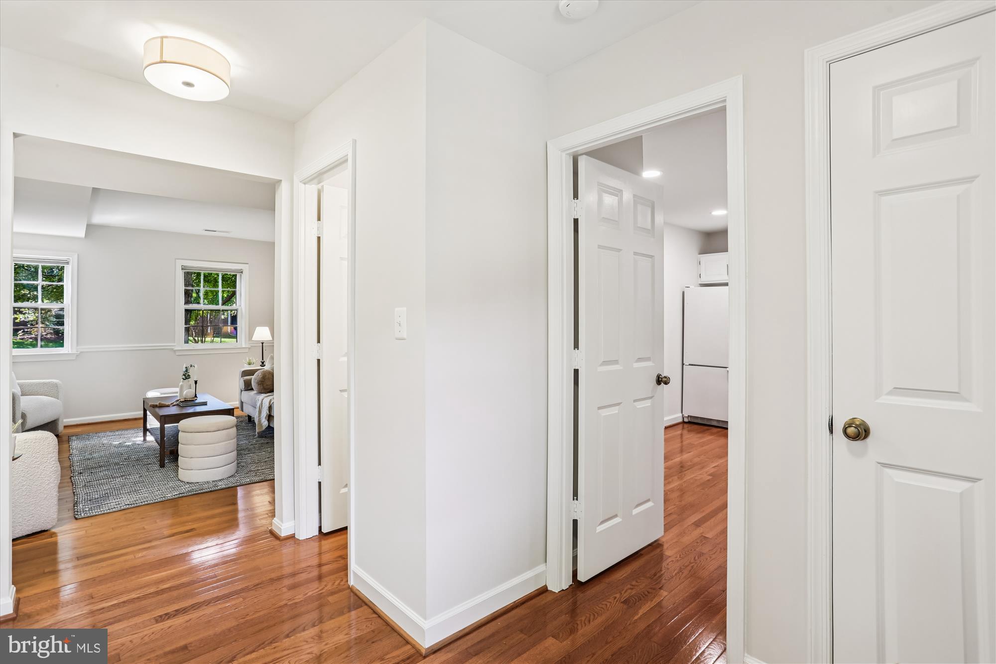 6734 Hillandale Road, Unit 9 Chevy Chase, MD 20815 - Photo 7 of 51 Foyer entry with hardwood flooring