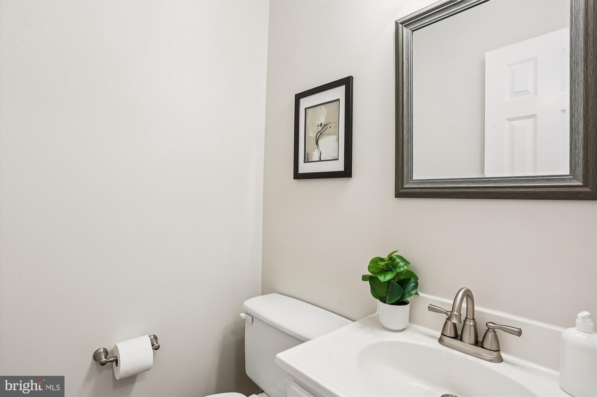 6734 Hillandale Road, Unit 9 Chevy Chase, MD 20815 - Photo 8 of 51 Main level updated powder room