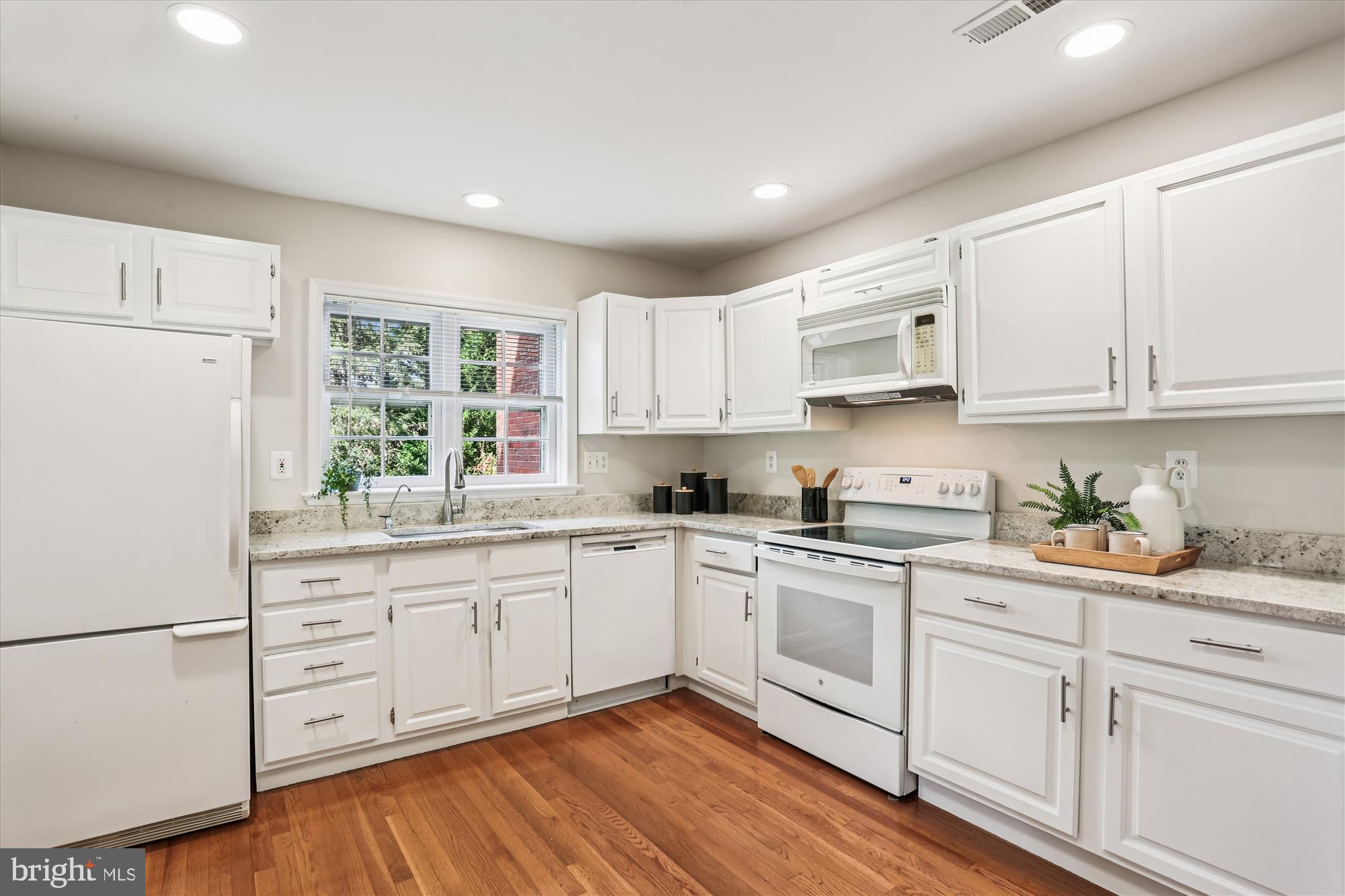 6734 Hillandale Road, Unit 9 Chevy Chase, MD 20815 - Photo 9 of 51 Remodeled kitchen with granite countertops