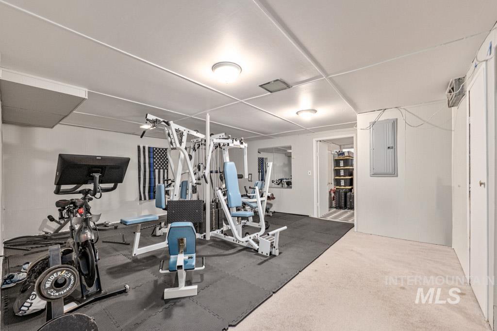 259 Highway 12 Pomeroy, WA 99347 - Photo 29 of 45 Dedicated fitness area featuring rubber mat flooring, overhead lighting, and white walls