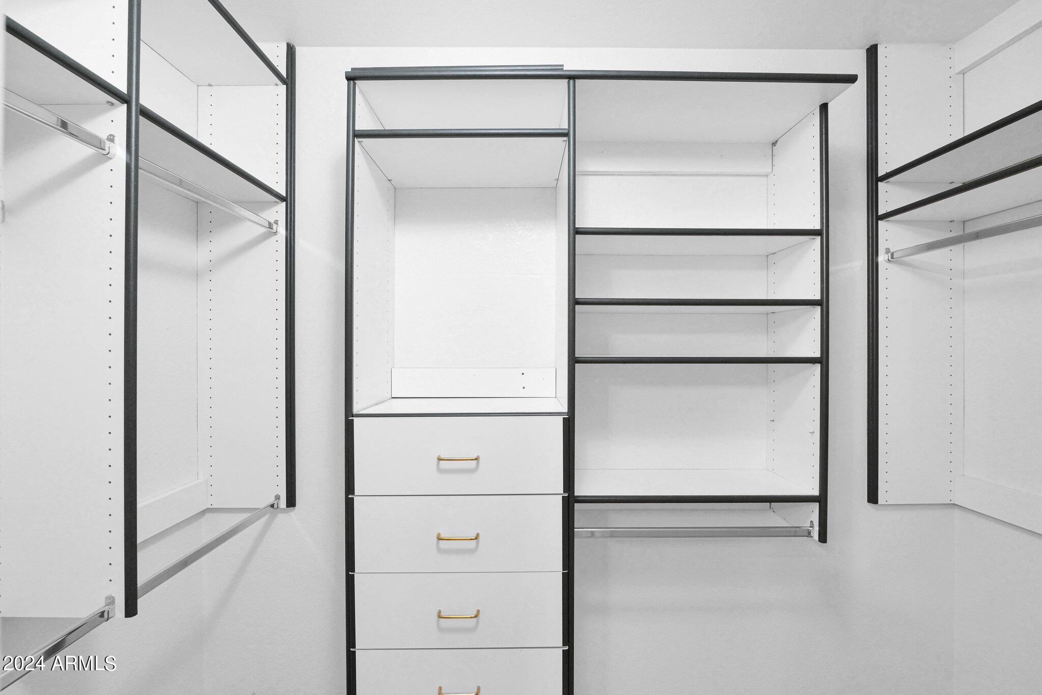 3218 North Ravine Mesa, AZ 85215 - Photo 19 of 36 Primary Walk-in Closet