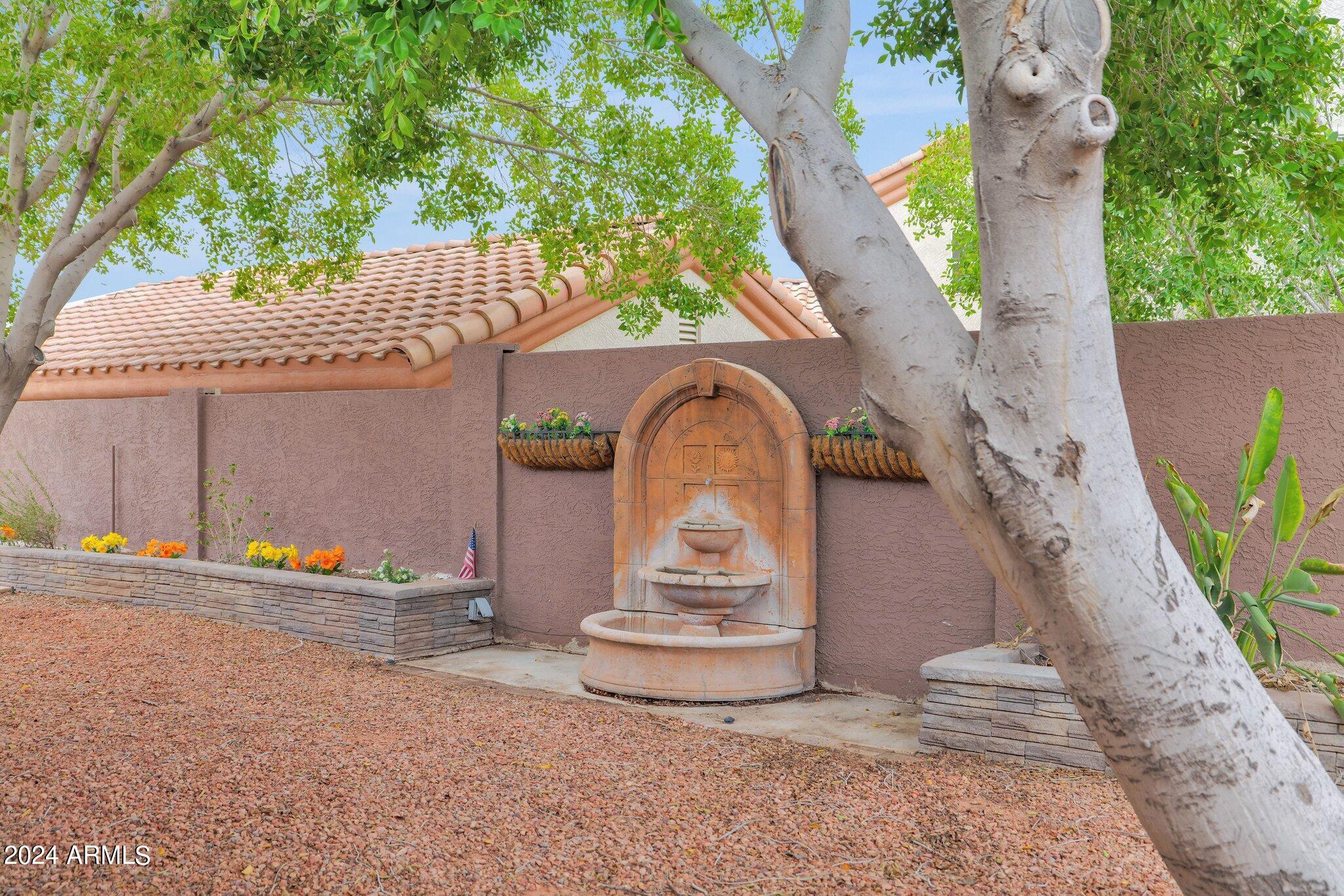 3218 North Ravine Mesa, AZ 85215 - Photo 29 of 36 Fountain in Backyard