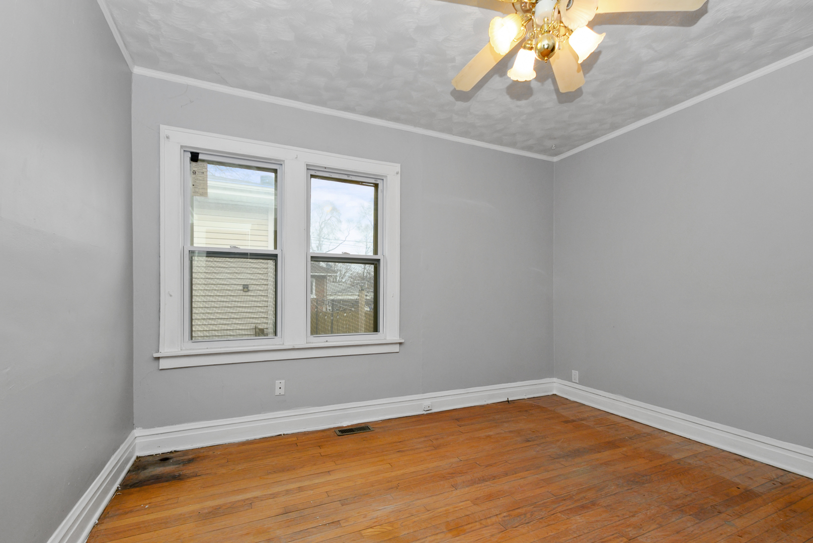 14823 Grant Street Dolton, IL 60419 - Photo 17 of 37 an empty room with a window