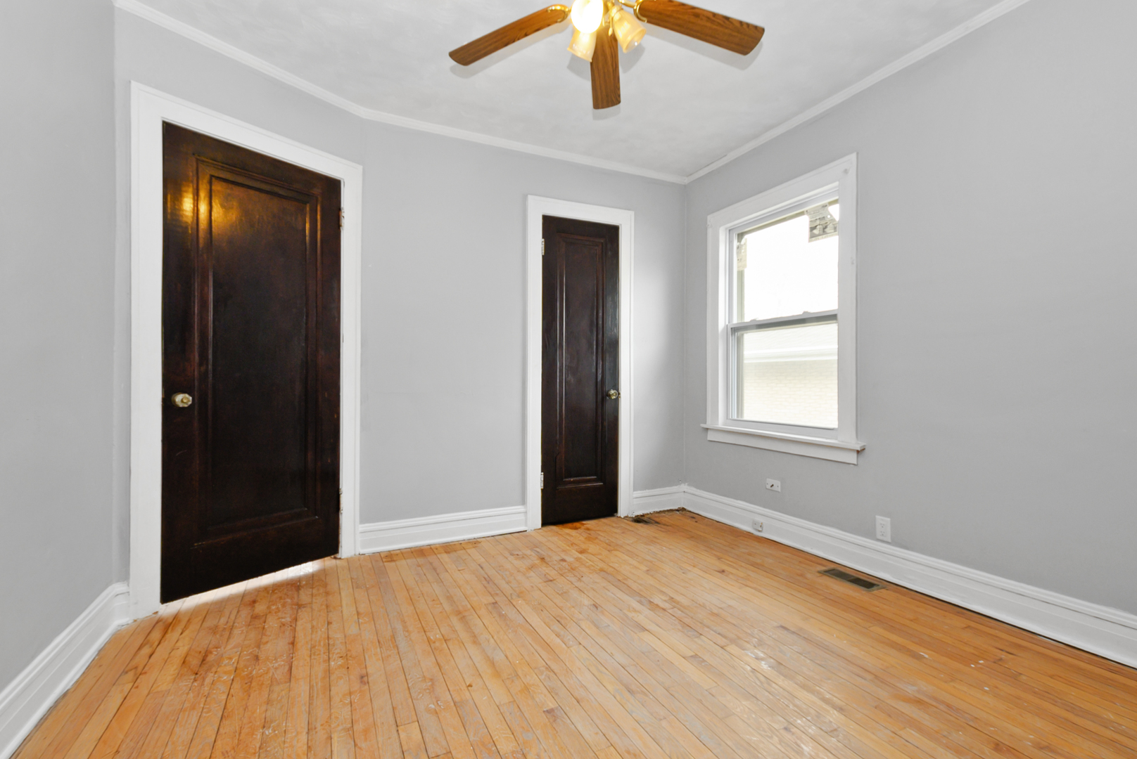 14823 Grant Street Dolton, IL 60419 - Photo 22 of 37 a bedroom with a bed and a window