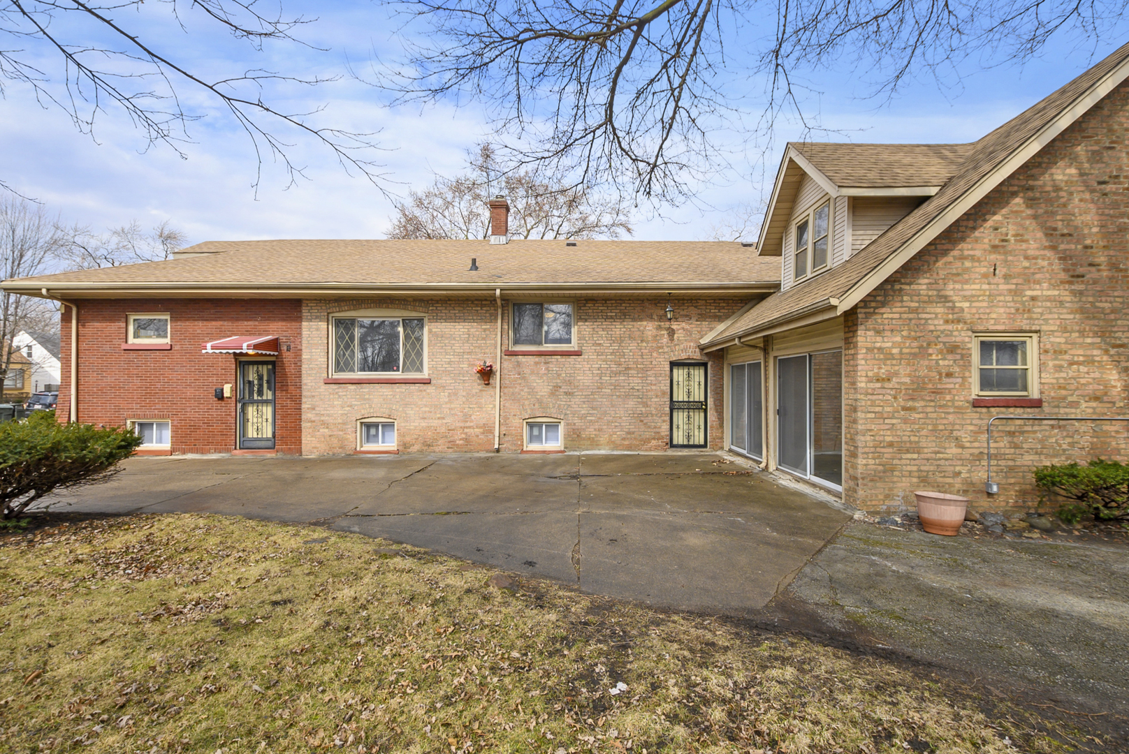 14823 Grant Street Dolton, IL 60419 - Photo 36 of 37 a front view of a house with a yard