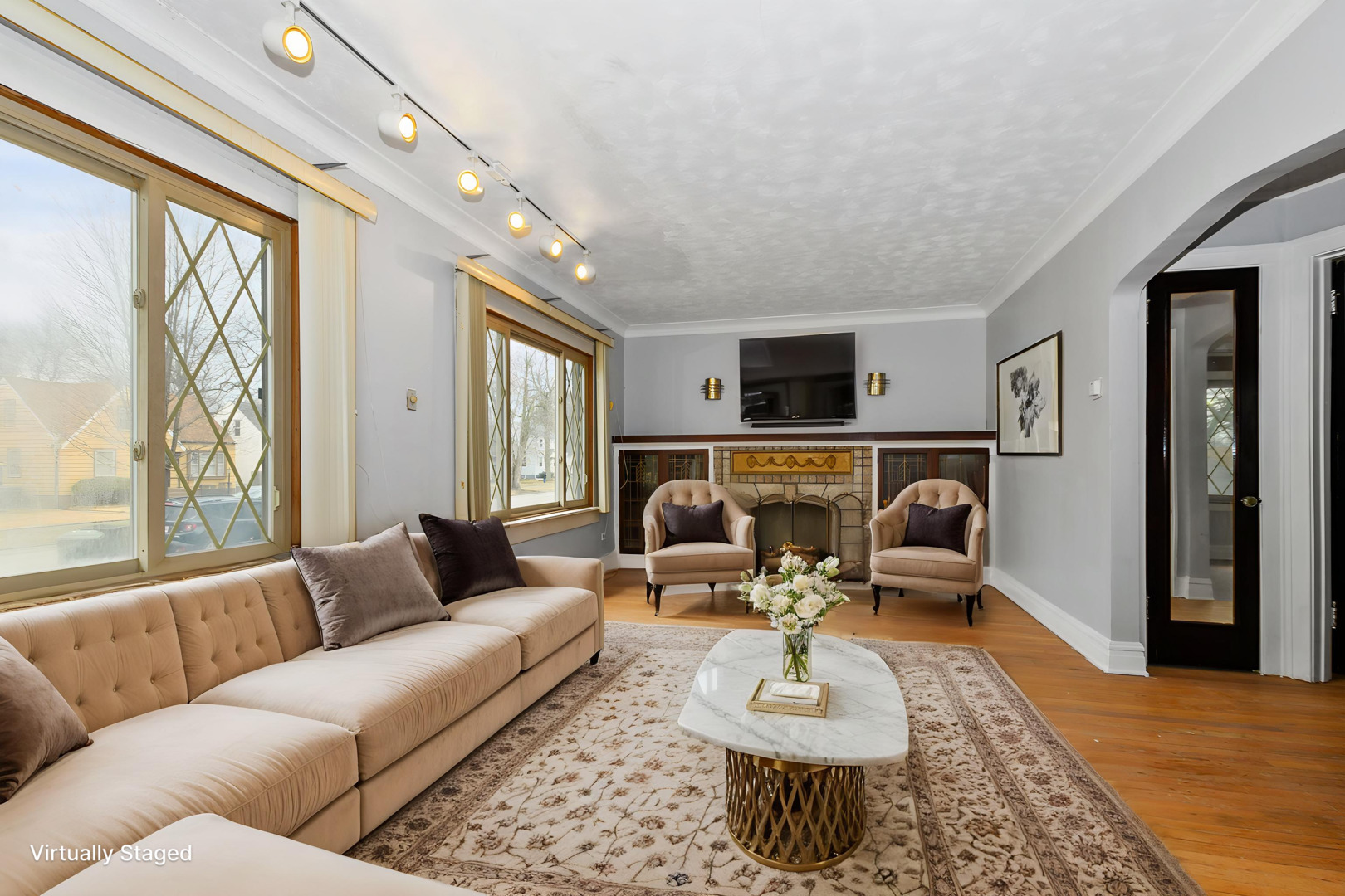 14823 Grant Street Dolton, IL 60419 - Photo 7 of 37 a living room with furniture fireplace and a large window