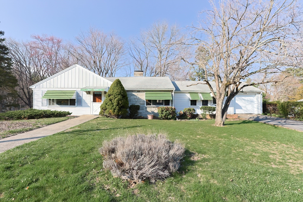 58 Cutler Drive Framingham, MA 01702 - Photo 2 of 35 a front view of a house with a yard