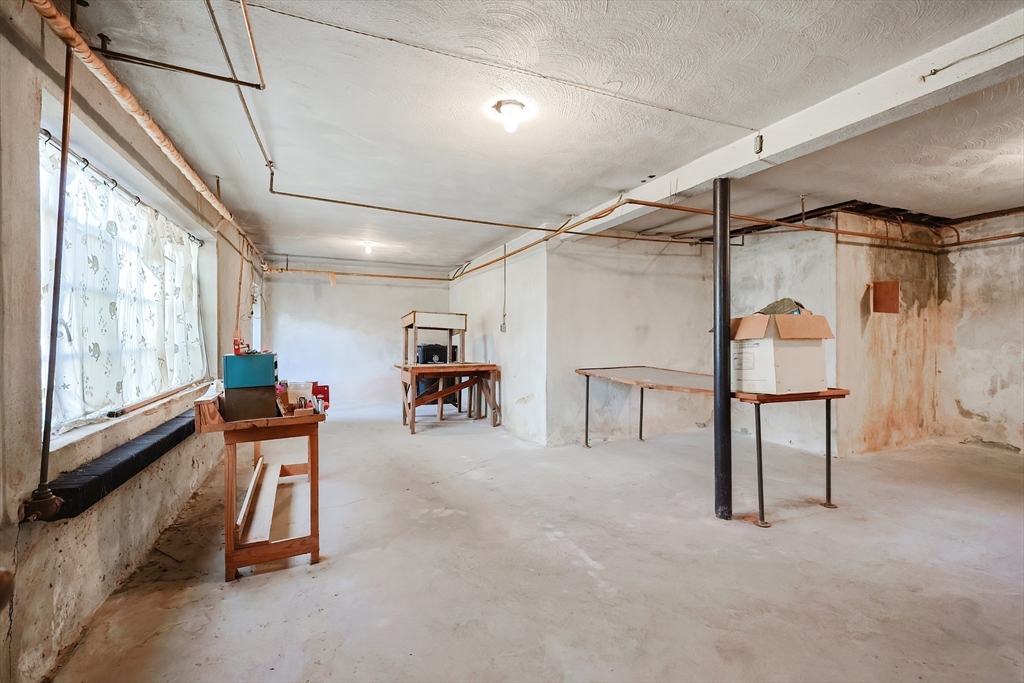 58 Cutler Drive Framingham, MA 01702 - Photo 32 of 35 a view of a room with gym equipment