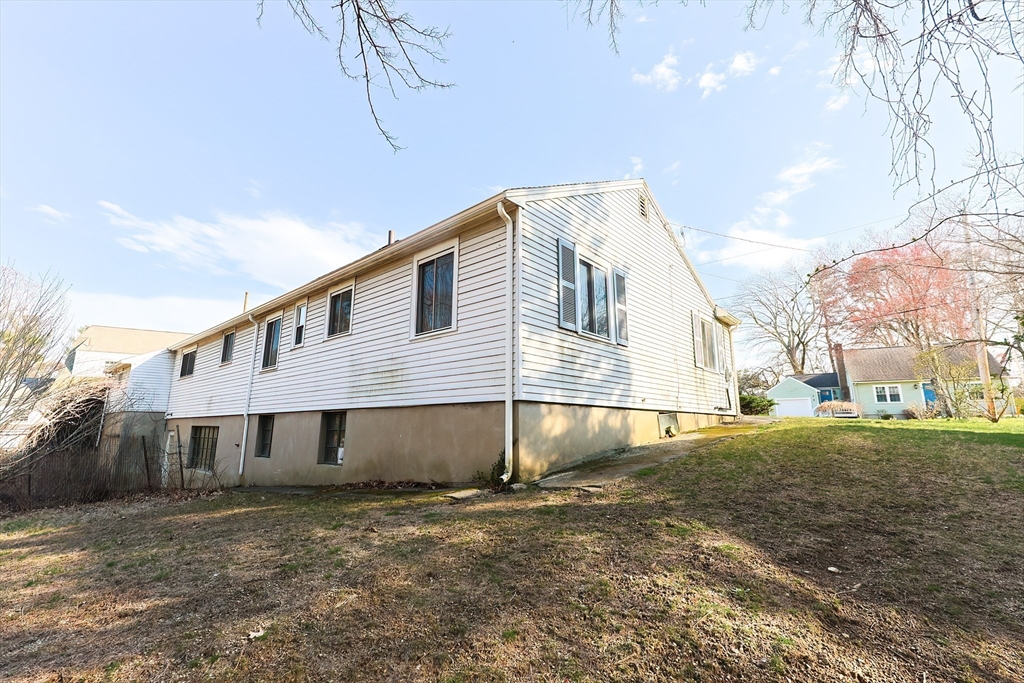 58 Cutler Drive Framingham, MA 01702 - Photo 33 of 35 a view of a house with a yard