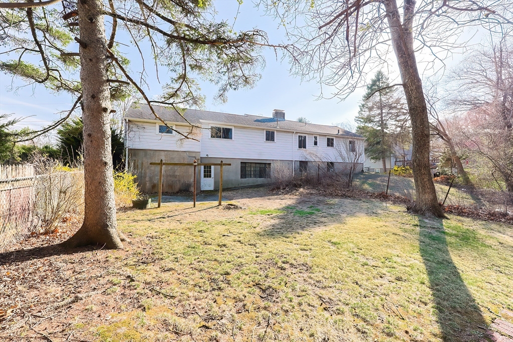 58 Cutler Drive Framingham, MA 01702 - Photo 35 of 35 a view of a house with a snow in the yard
