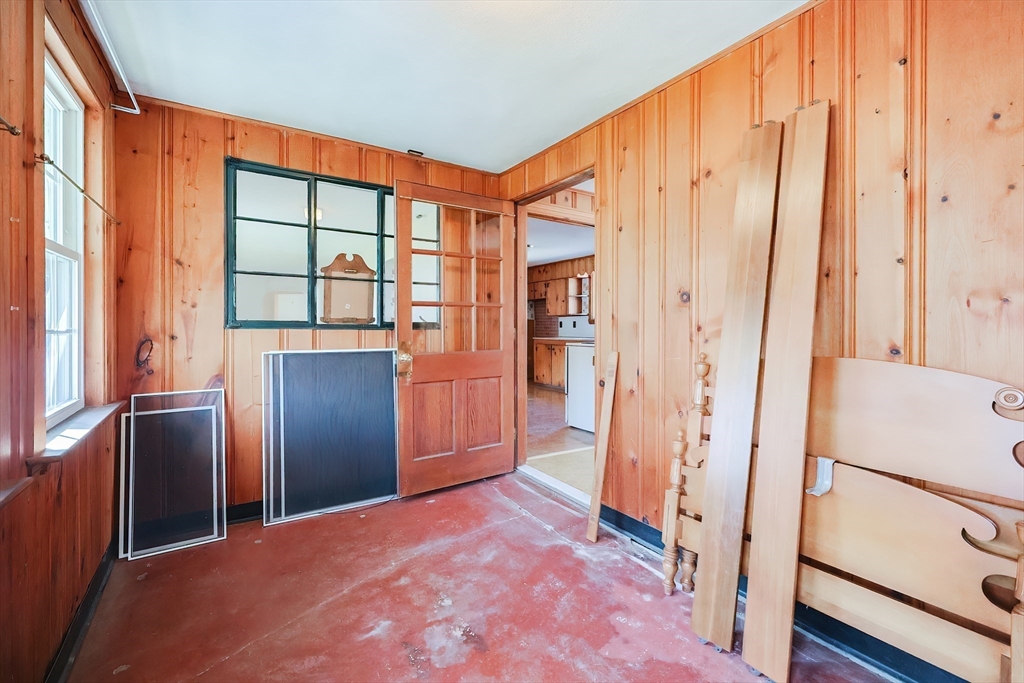 58 Cutler Drive Framingham, MA 01702 - Photo 9 of 35 a view of a refrigerator in kitchen and wooden floor
