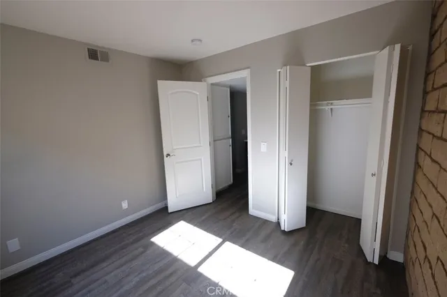 a bathroom with a sink vanity and mirror