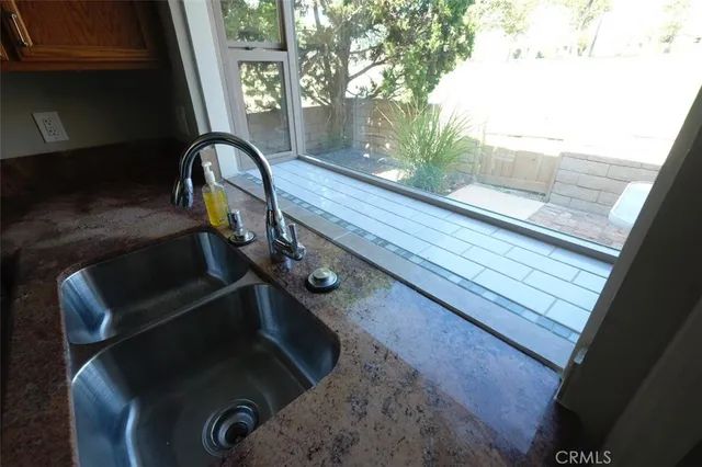 a view of a room with a large window