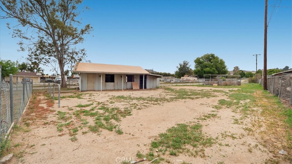 1607 Temescal Avenue Norco, CA 92860 - Photo 16 of 20 a front view of a house with a yard