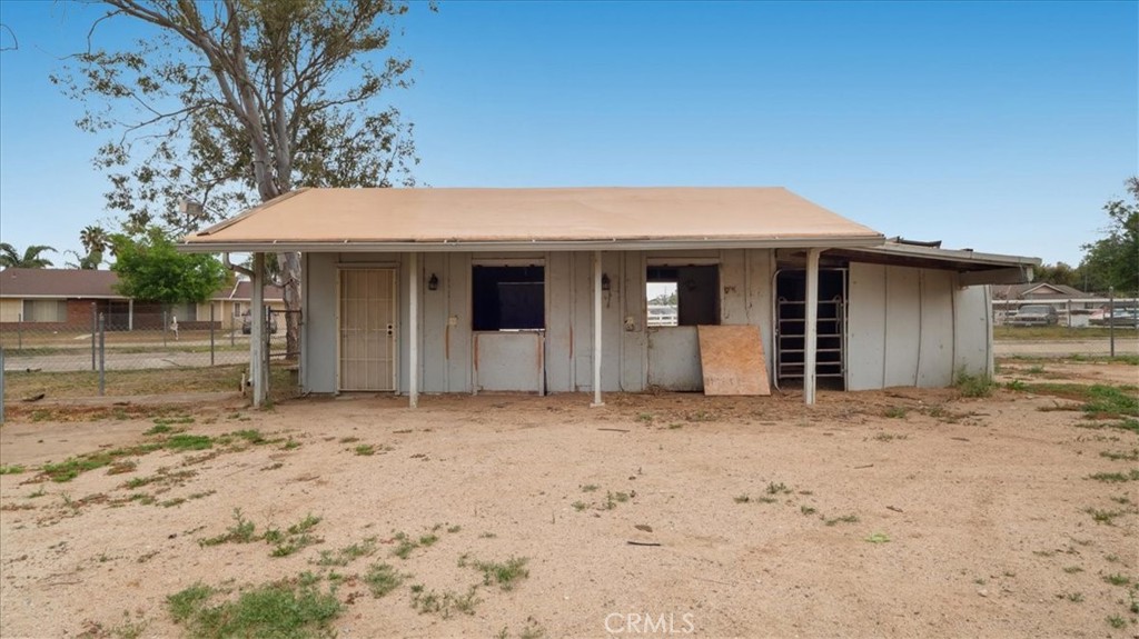 1607 Temescal Avenue Norco, CA 92860 - Photo 17 of 20 a front view of a house with a yard