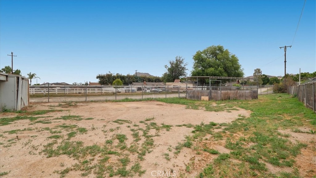 1607 Temescal Avenue Norco, CA 92860 - Photo 19 of 20 a view of a lake with houses in the background