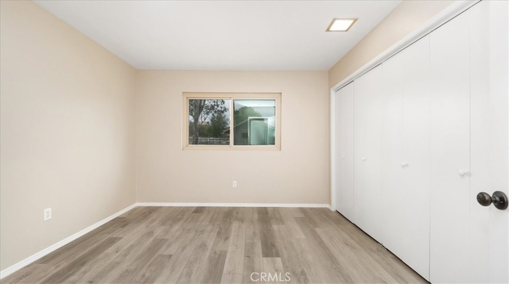 1607 Temescal Avenue Norco, CA 92860 - Photo 9 of 20 an empty room with a window