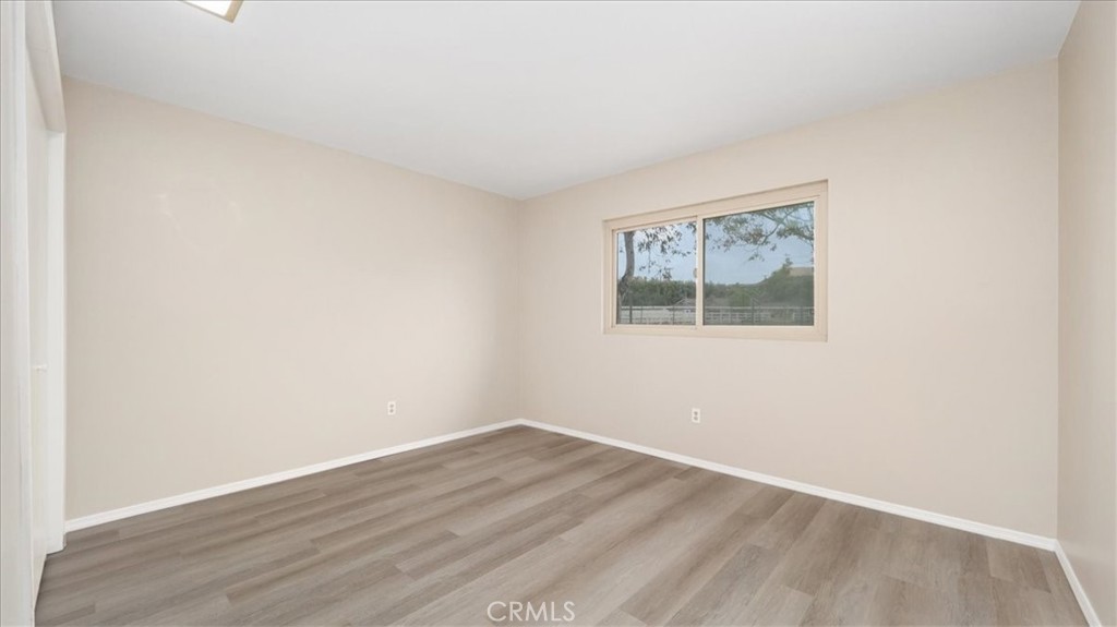 1607 Temescal Avenue Norco, CA 92860 - Photo 10 of 20 wooden floor in an empty room