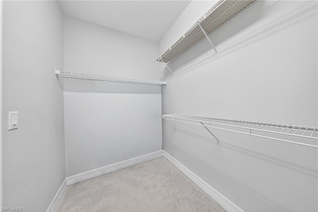 11920 Bourke Place Fort Myers, FL 33913 - Photo 23 of 45 a view of small space with racks on the wall