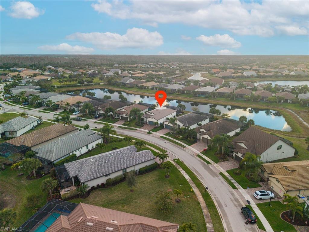 11920 Bourke Place Fort Myers, FL 33913 - Photo 38 of 45 an aerial view of residential houses with outdoor space