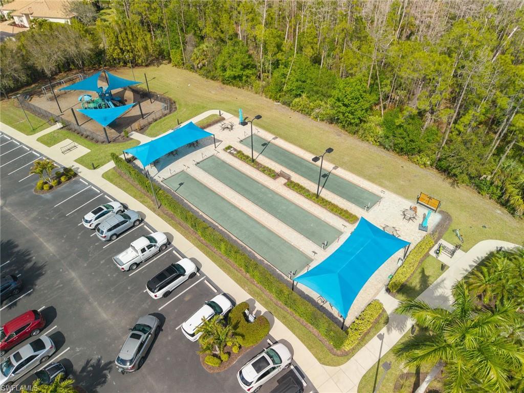 11920 Bourke Place Fort Myers, FL 33913 - Photo 43 of 45 a view of a swimming pool with chairs and plants