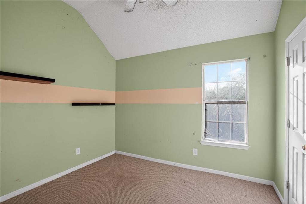 3429 Sumter Place Decatur, GA 30034 - Photo 11 of 30 a view of an empty room with a window