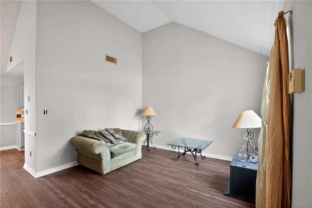 3429 Sumter Place Decatur, GA 30034 - Photo 13 of 30 a living room with furniture and a wooden floor