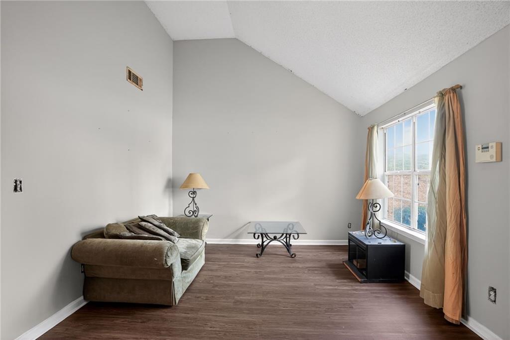 3429 Sumter Place Decatur, GA 30034 - Photo 15 of 30 a bedroom with furniture and a wooden floor