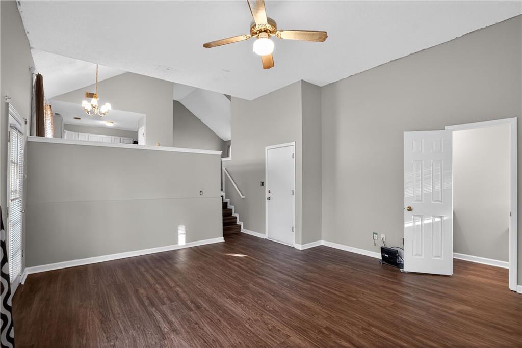 3429 Sumter Place Decatur, GA 30034 - Photo 16 of 30 wooden floor in an empty room with a window