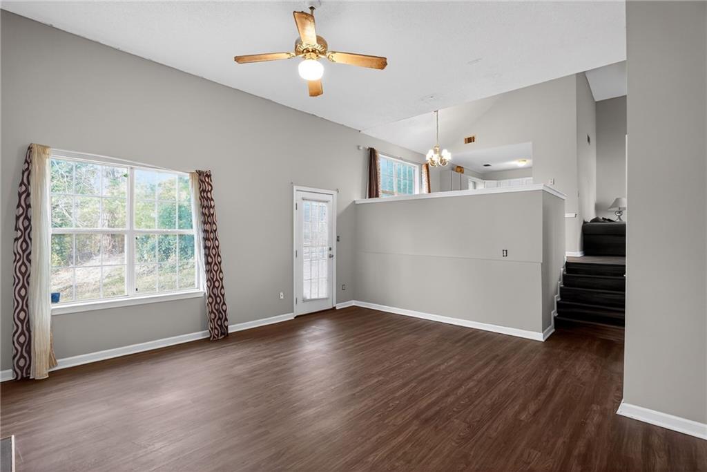 3429 Sumter Place Decatur, GA 30034 - Photo 17 of 30 a view of an empty room with a window and wooden floor