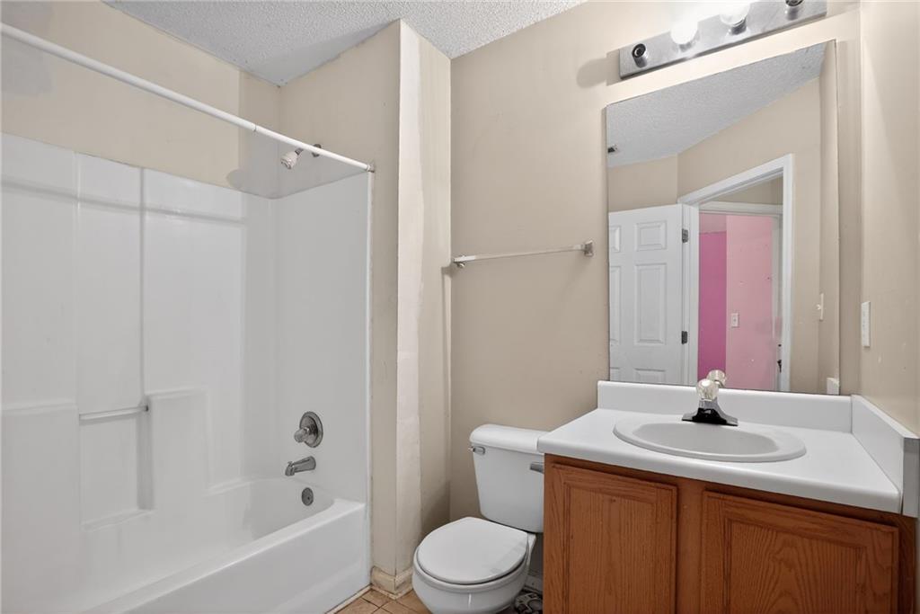 3429 Sumter Place Decatur, GA 30034 - Photo 30 of 30 a bathroom with a sink and a mirror