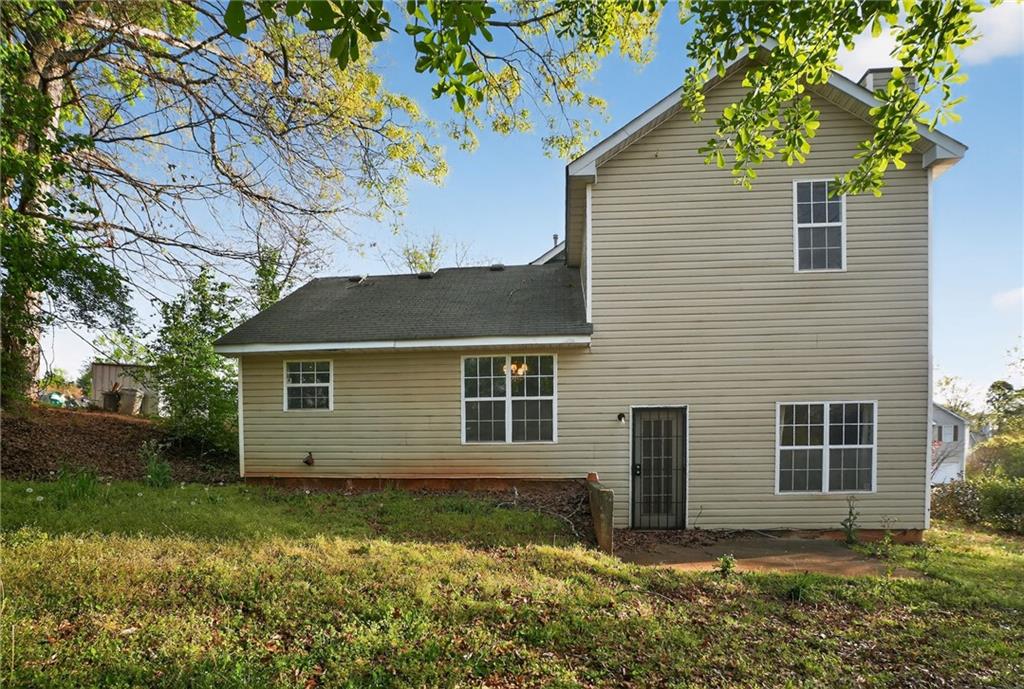 3429 Sumter Place Decatur, GA 30034 - Photo 3 of 30 a view of a house with a yard