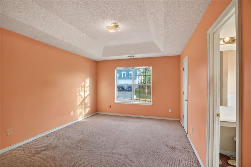 3429 Sumter Place Decatur, GA 30034 - Photo 8 of 30 a view of an empty room with a window