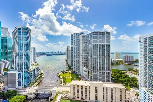 a view of a city with tall buildings