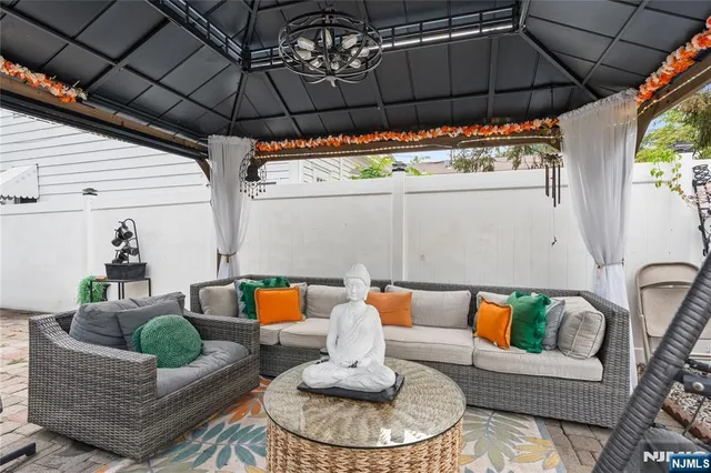 a outdoor living space with furniture and outdoor view